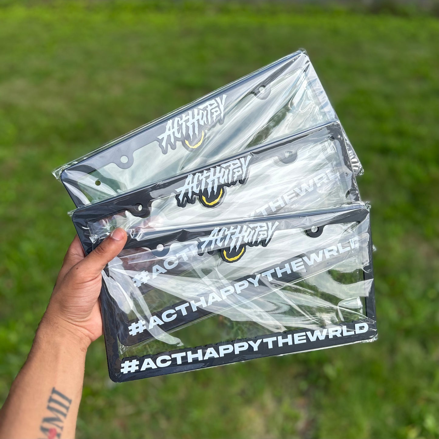ActHappyTheWrld License Plate Frame